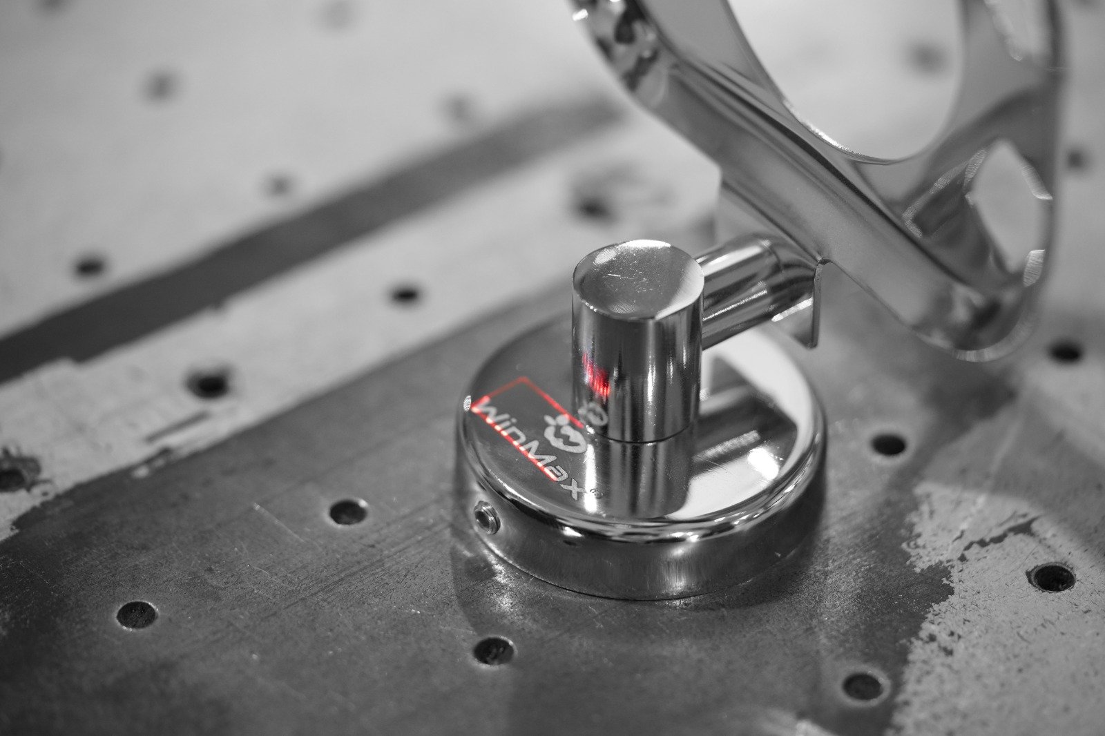 Shivam Impex team working on bathroom hardware designs in a modern workspace